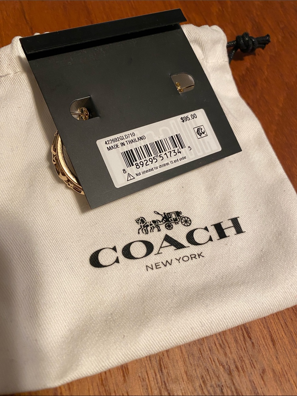 Coach Gold-Tone Hoop Earrings with Signature Cutouts - Picture 3 of 4